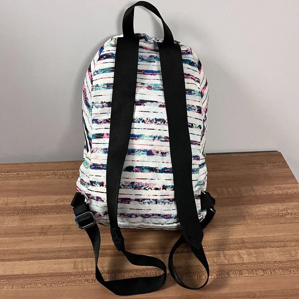 Ivivva by Lululemon Girl's Active Small Backpack Multi Stripe Bottom Shoe Pocket